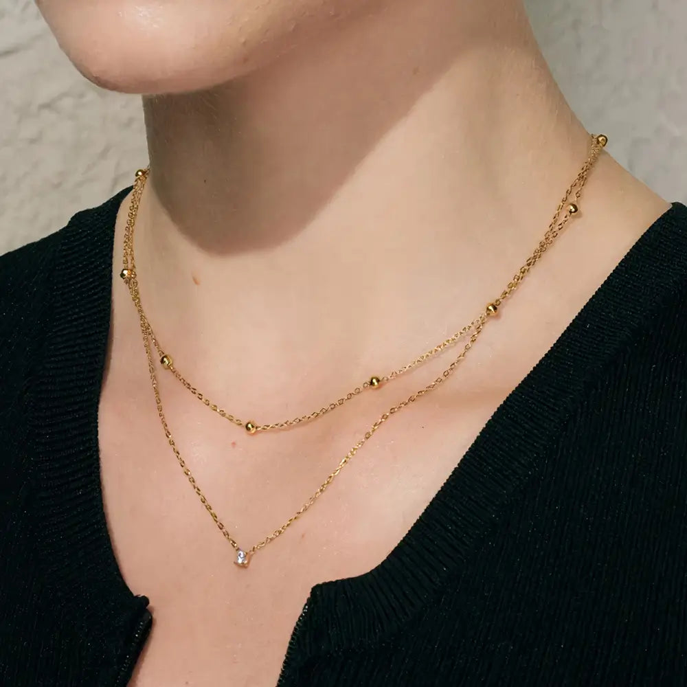 Colar Feminino Dourado duplo ponto de luz com zircônia Liora em composição sofisticada e minimalista
