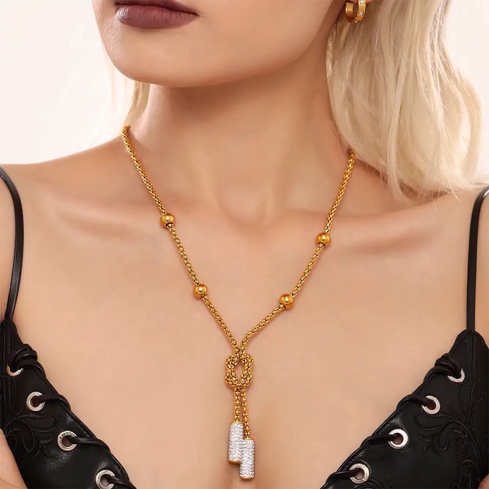Colar Feminino Dourado nó com contas Eliséa em design elegante e toque sofisticado