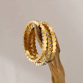 Anel Feminino Dourado Triplo Ondulado com Zircônias Cúbicas Luminara - Banhado a Ouro 18k