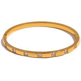 Bracelete Feminino Dourado fino cravejado com zircônias e acabamento espelhado