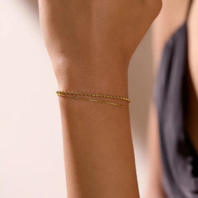 Pulseira Feminina Dourada Dupla Corrente Lisa e de Contas Celine - Banhada a Ouro 18k
